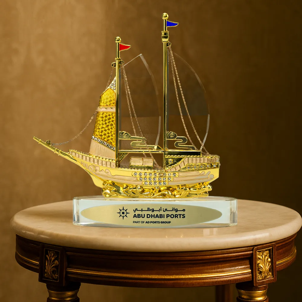 Golden Boat-Shaped Memento in Metal with Glass Base