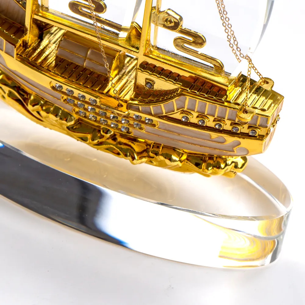 Golden Boat-Shaped Memento in Metal with Glass Base